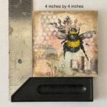 Mix Media Bee beside ruler